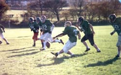 Kickoff to the inaugural 1994 season. Darren Barsby hoists the ball as Ian Wilding, Matt Whitehead, Matt Shaw, Lee Barfoot and Stuart 'Mad Dog' Peskett chase.