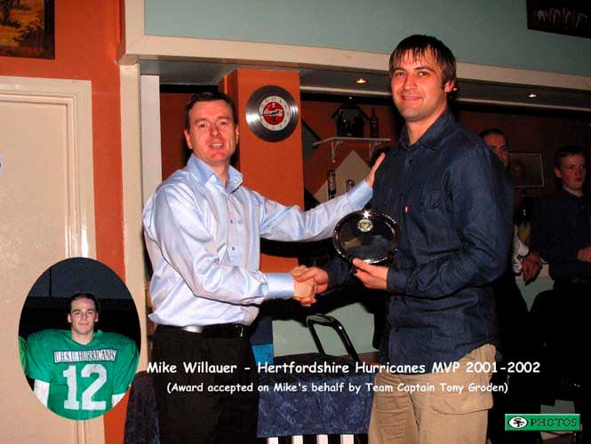 Tony Groden collects the club MVP award for Mike Willauer from Head Coach Jim Messenger.