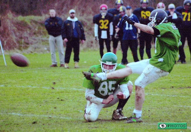 Richard Savage kicks an extra point against Surrey. Photo: Roger Stacey