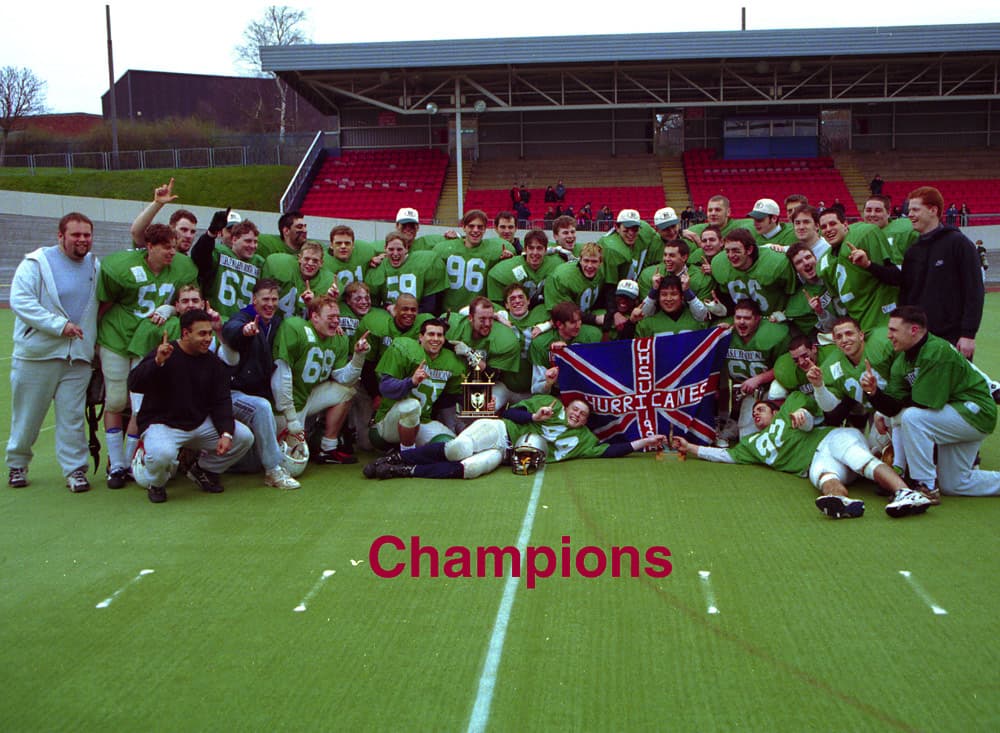 College Bowl 98: the Hurricanes celebrate with the trophy and the UHSU Hurricanes flag, 15 March 1998 (“Champions” on the photo)