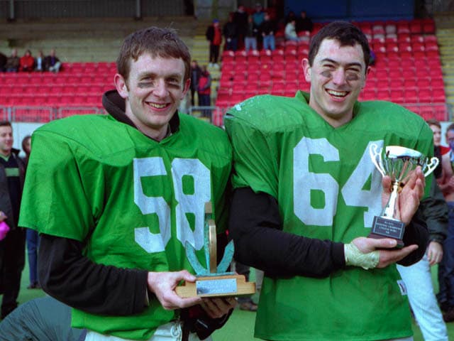 Club President Anthony Fitzpatrick and Team Captain Huw Stacey with the College Bowl XIII trophies.