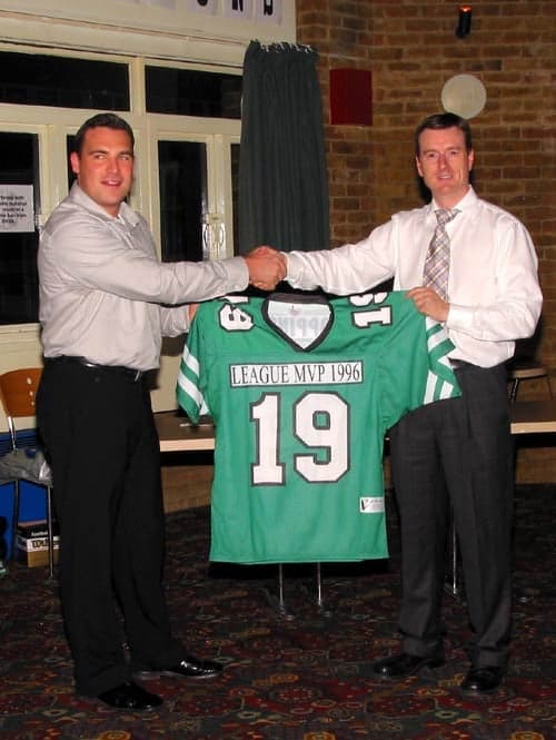 Jim Messenger retires Matt Coppinger’s #19 shirt (“League MVP 1996” on the shirt), Rookies and Legends Evening 2002