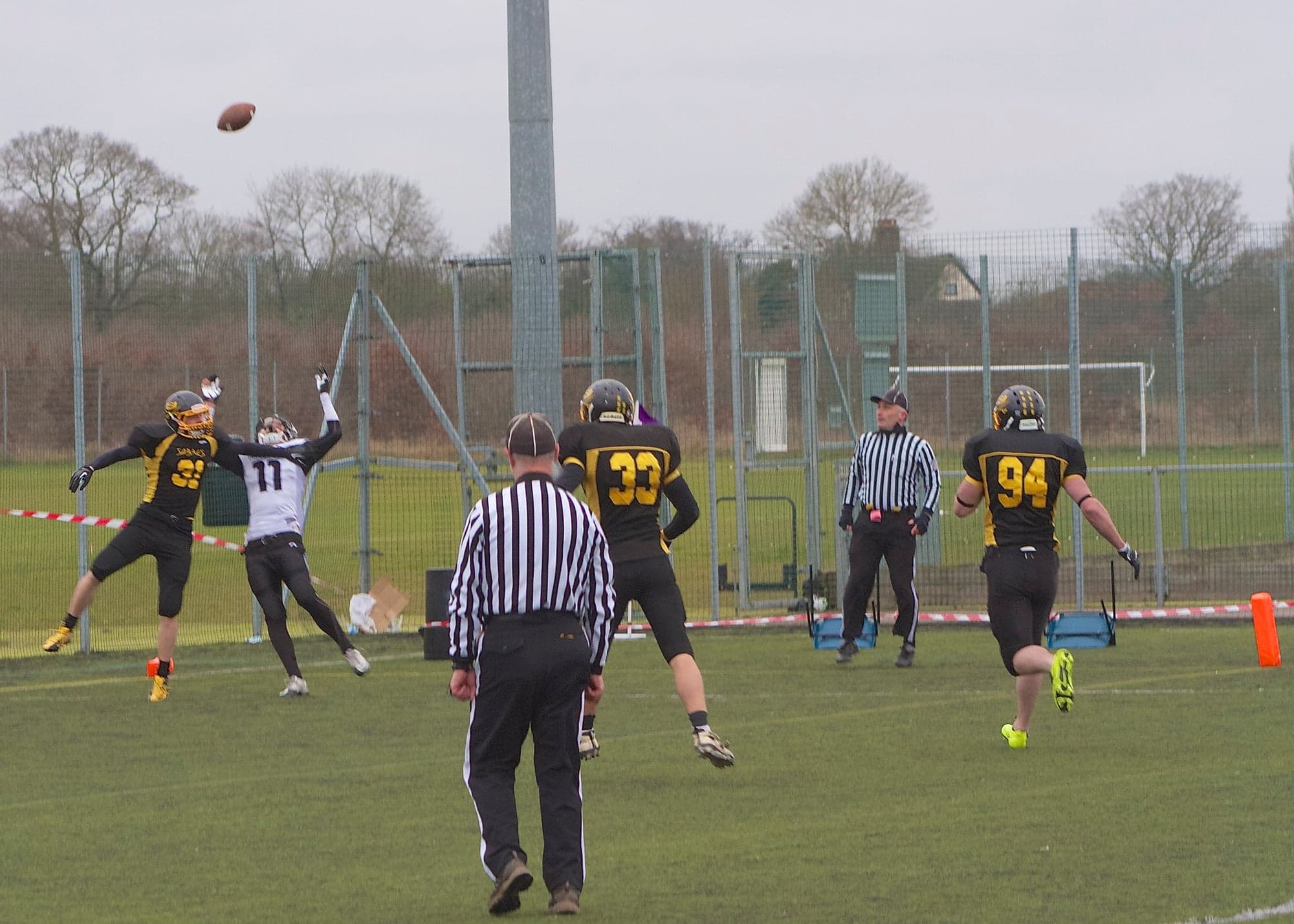 Hertfordshire Hurricanes' wide receiver Nick Bagnal is thwarted in the end zone early in the game by Adam Dickens for Sheffield Sabres.