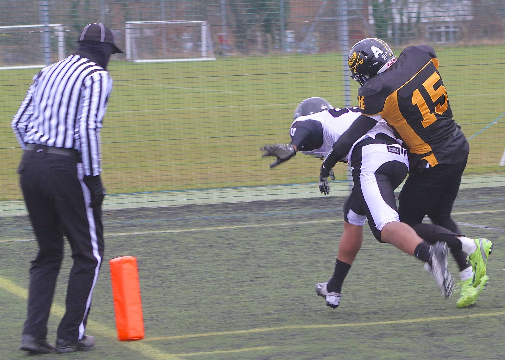 Irresistible force - wide receiver Sam Adex scores Hertfordshire Hurricanes' third touchdown despite the best efforts of David Saul for Sheffield Sabres.